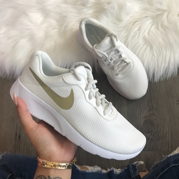 nike tanjun metallic gold